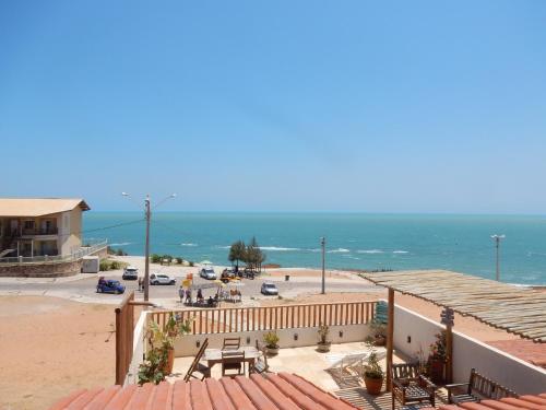a view of the beach from the roof of a building at Pousada Ah Mar in Canoa Quebrada