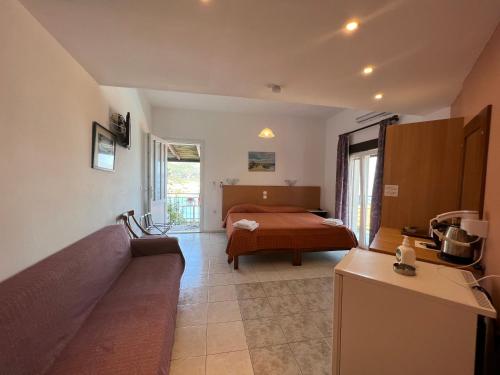 Postel nebo postele na pokoji v ubytování Hotel Oceanis