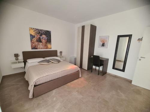 Ένα ή περισσότερα κρεβάτια σε δωμάτιο στο b&b THE WORLD