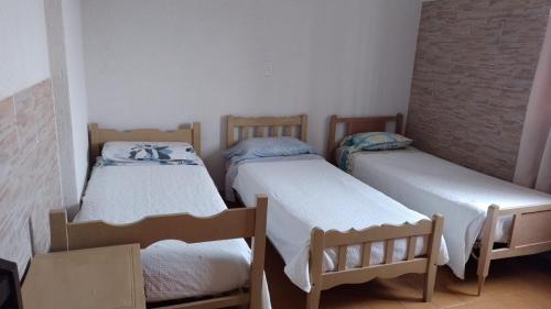 Ein Bett oder Betten in einem Zimmer der Unterkunft Hotel Atlantic