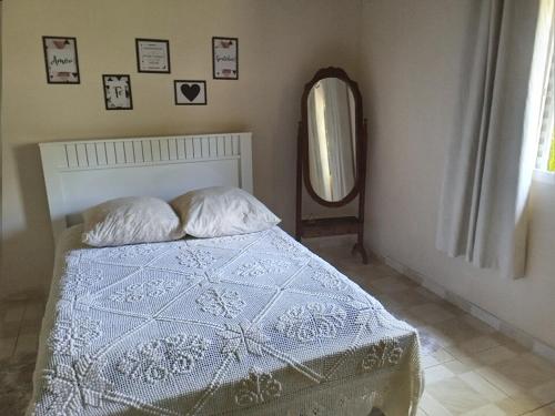 En eller flere senge i et værelse på Casa Pousada Vila Verde