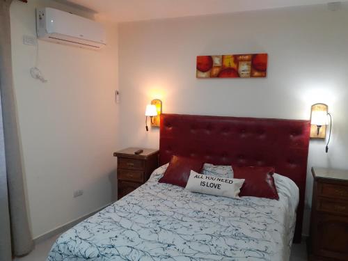 Postel nebo postele na pokoji v ubytování Departamento 1 Complejo Sol de Oeste