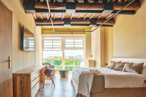 Katil atau katil-katil dalam bilik di ACOUGA Hotel Boutique