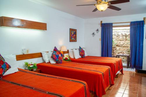 Ένα ή περισσότερα κρεβάτια σε δωμάτιο στο Hotel Panchoy by AHS