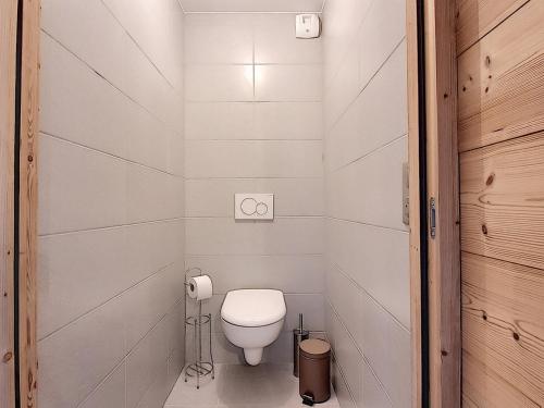 Et badeværelse på Appart. 3 ch, proche pistes, parking privé - FR-1-416-68