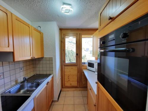 Appartement Classique aux Ménuires pour 8, ski aux pieds, animaux admis - FR-1-452-182