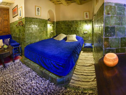 Hôtel Riad Dar Daïfにあるベッド