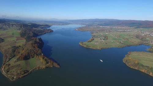 an aerial view of a large river with a city at DOMKI JANOSIK - Janosik Premium in Łopuszna
