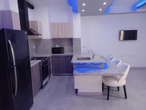 A cozinha ou cozinha compacta de Jasmine Resort & Aqua park