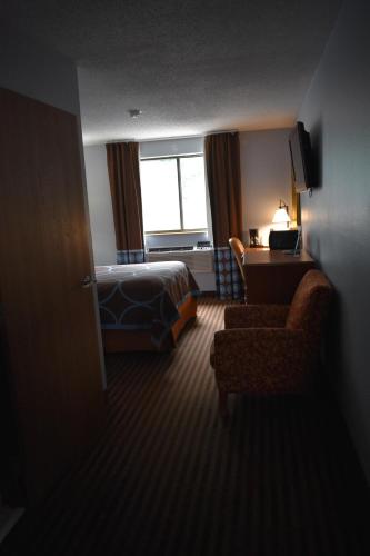 Super 8 by Wyndham La Vale/Cumberland Areaにあるベッド