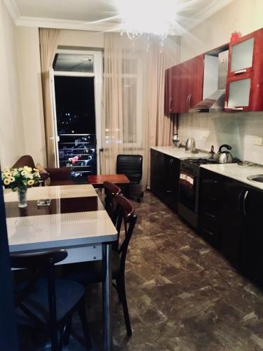 Virtuvė arba virtuvėlė apgyvendinimo įstaigoje Apartment Gulia