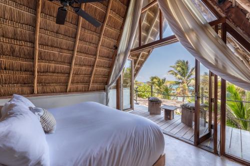 Postel nebo postele na pokoji v ubytování La Valise Tulum, member of Small Luxury Hotels