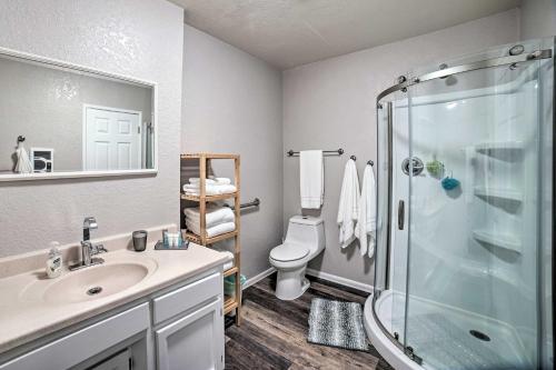 a bathroom with a shower and a sink and a toilet at Lovely Snohomish Studio Near Boating and Hiking in Snohomish