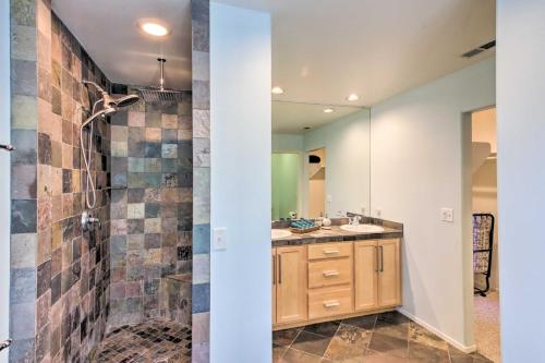 a bathroom with two sinks and a shower at Pine Mountain Club Home with Beautiful View! in Frazier Park