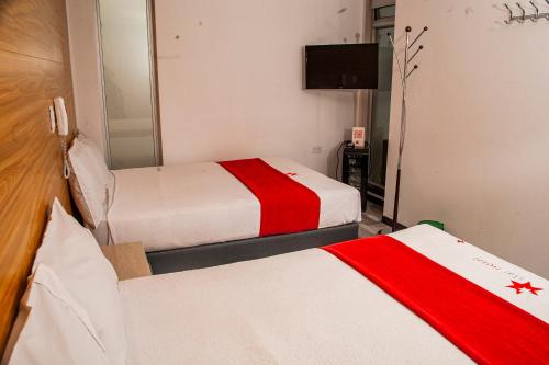 Ένα ή περισσότερα κρεβάτια σε δωμάτιο στο Hotel Star Pasto
