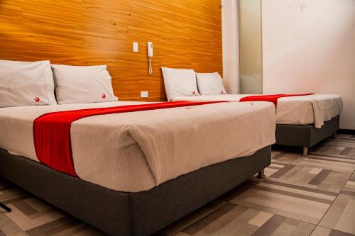 Ένα ή περισσότερα κρεβάτια σε δωμάτιο στο Hotel Star Pasto