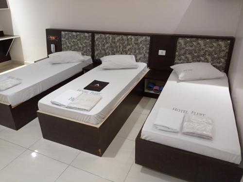 Una cama o camas en una habitación de Hotel Flert - Tatuapé