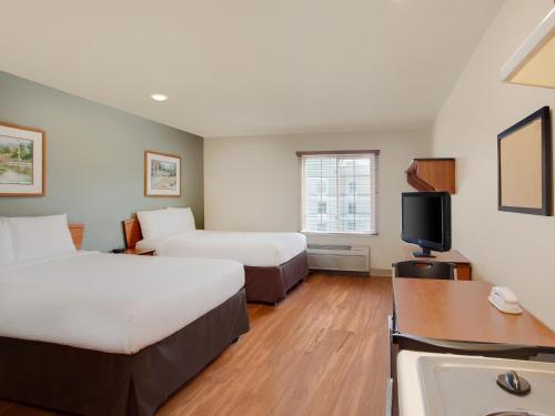 Postel nebo postele na pokoji v ubytování Extended Stay America Select Suites - Mobile - I-65