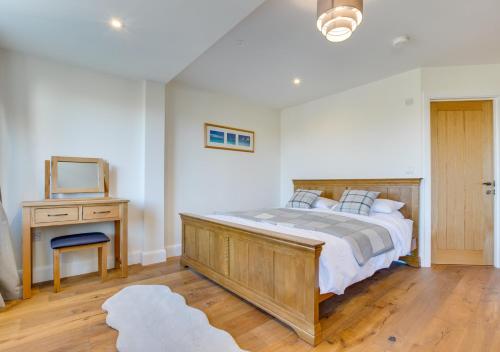 Ένα ή περισσότερα κρεβάτια σε δωμάτιο στο Bryn Y Mor