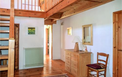 a room with a staircase and a desk and chair at Beautiful Home In Loisia With Wifi in Loisia