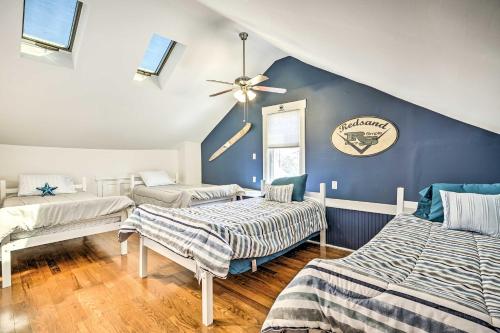 a bedroom with two beds and a ceiling fan at Idyllic Atlantic City Home - 1 Block to Beach in Atlantic City