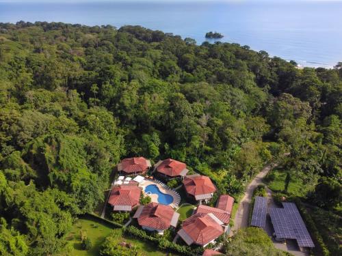 an aerial view of a house in the forest at Terrazas del Caribe Aparthotel in Puerto Viejo