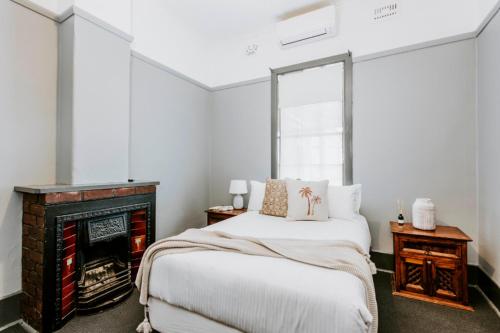 Postel nebo postele na pokoji v ubytování Federal Hotel Mudgee