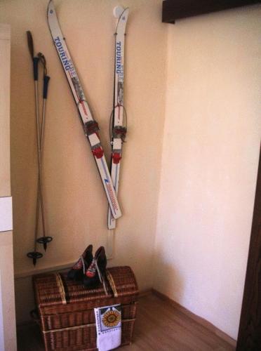 a room with two baseball bats hanging on the wall at Zeche 33 in Kurort Oberwiesenthal