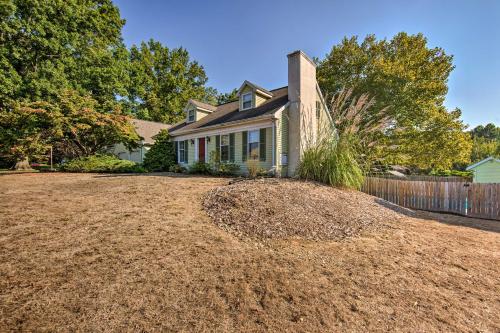 a house with a large pile of dirt in front of it at Amish Country Apartment with Cozy Fireplace! in New Holland