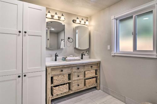 a bathroom with a sink and a mirror at Charming Hillsboro Home with Yard, Dogs Welcome in Hillsboro