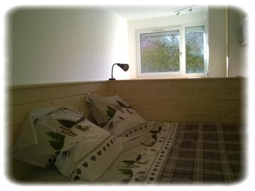 Katil atau katil-katil dalam bilik di La Serre - Centre du village - Départ des pistes de fond et Skibus à 50m