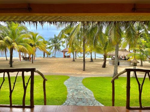 a view of the beach from a resort window at Coco Grove Beach Resort, Siquijor Island in Siquijor
