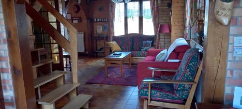 Ruang duduk di Gîte du bel air