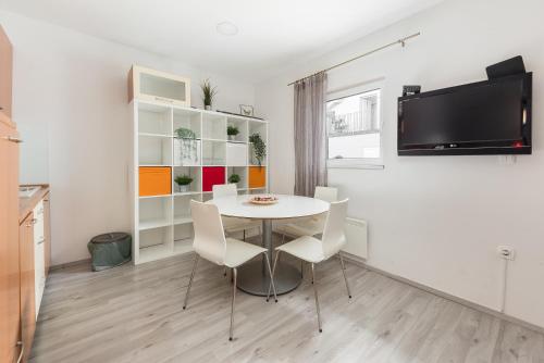 Televisyen dan/atau pusat hiburan di Apartments Berni