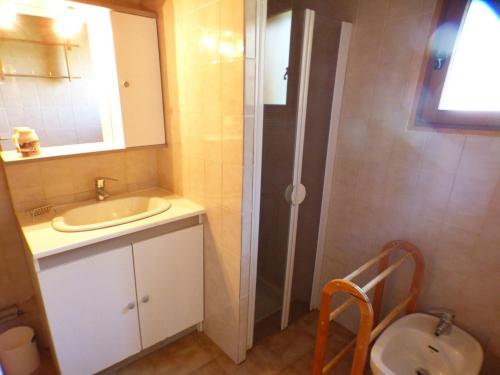 a bathroom with a sink and a toilet at Chalet Les Saisies, 4 pièces, 8 personnes - FR-1-594-42 in Hauteluce