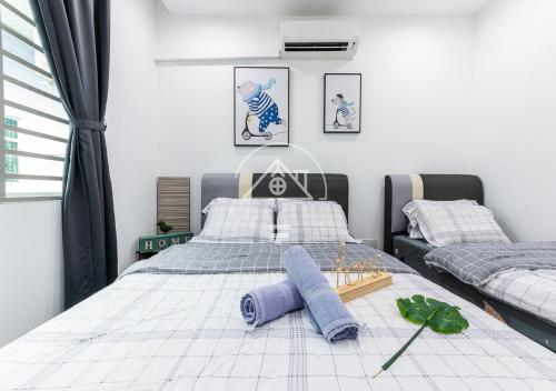 Katil atau katil-katil dalam bilik di 10-14Pax Port Dickson 4BR Double Storey House