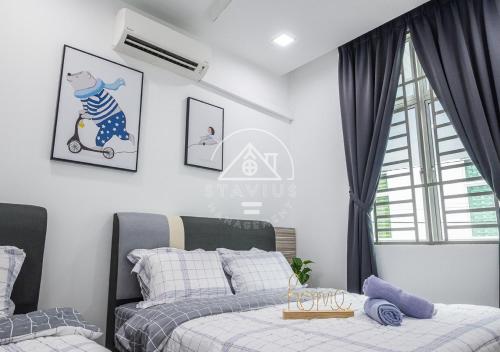 Katil atau katil-katil dalam bilik di 10-14Pax Port Dickson 4BR Double Storey House