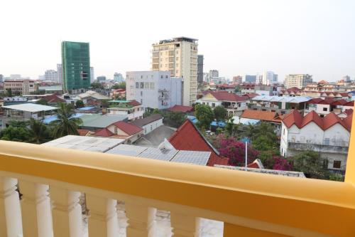 a view of a city from a balcony at Grand Residence in Phnom Penh