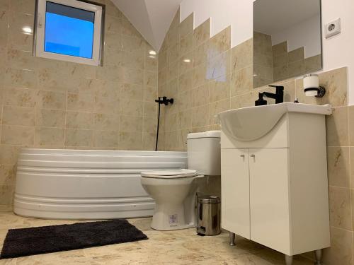 Koupelna v ubytování Casa Muntelui Râșnov
