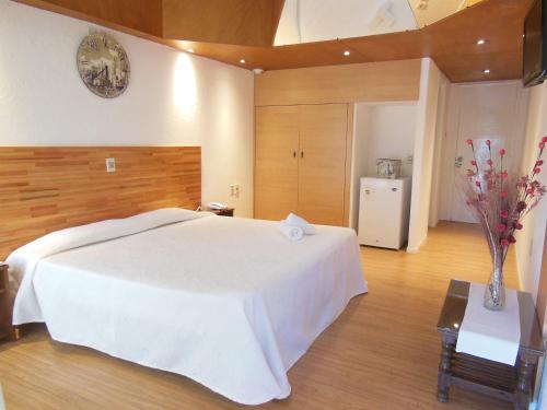 Postel nebo postele na pokoji v ubytování Hotel Bahamas