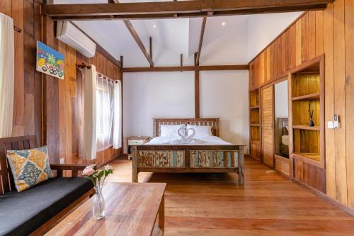 Ένα ή περισσότερα κρεβάτια σε δωμάτιο στο Casa Amor