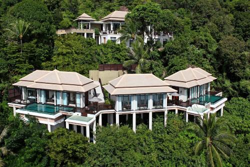 an aerial view of a house in the trees at Banyan Tree Samui in Lamai