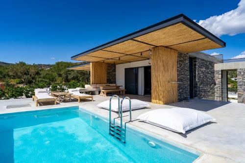 Πισίνα στο ή κοντά στο Akra Grammeno Beachfront Villas