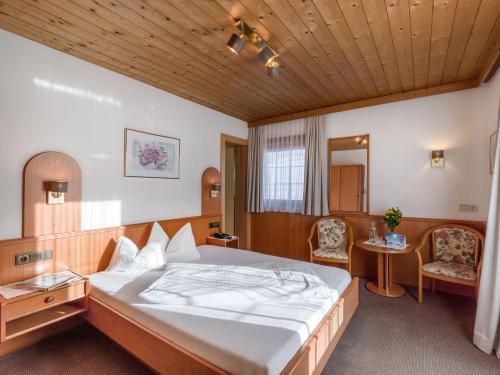 Postelja oz. postelje v sobi nastanitve Hotel Kössler