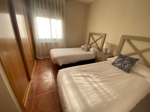Postel nebo postele na pokoji v ubytování Casa Royal, Mancha Real, Jaén