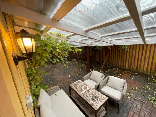 an overhead view of a patio with a table and chairs at Kauba Apartment in Viljandi