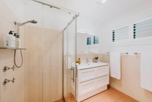 a bathroom with a shower and a sink at 'Omaroo' Homestead Escape amongst Rolling Hills in Mudgee