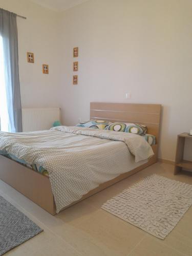 Posteľ alebo postele v izbe v ubytovaní chloi house