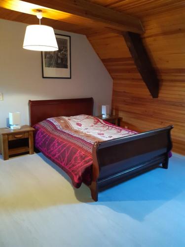 Un pat sau paturi într-o cameră la L'anisaous