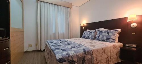 Cama o camas de una habitación en Apart hotel Adagio Moema Times Square - UH416